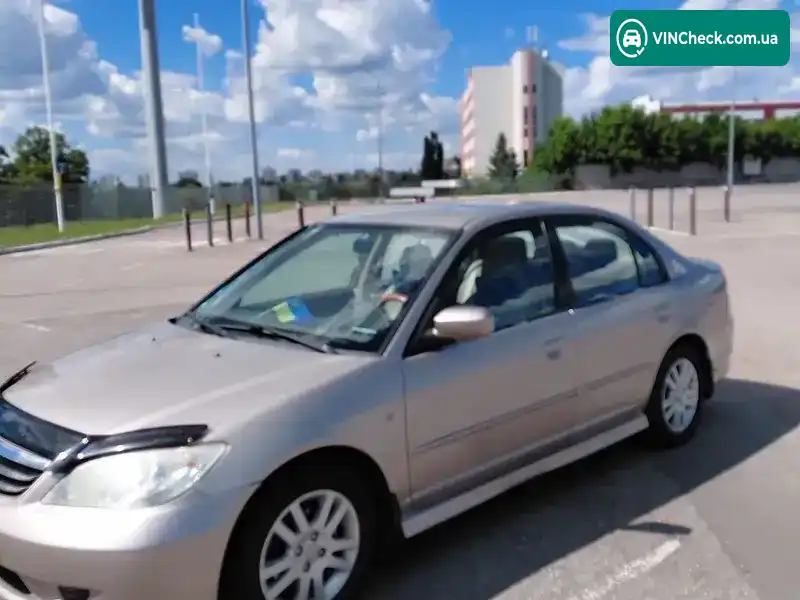Honda Civic 2004, фото з оголошення 1 з 7, VIN NLAES75204W301660