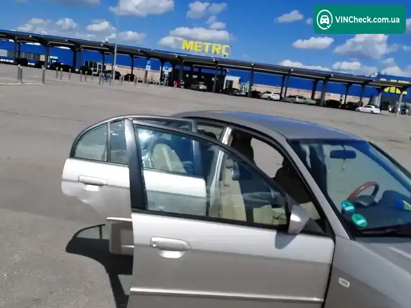 Honda Civic 2004, фото з оголошення 2 з 7, VIN NLAES75204W301660