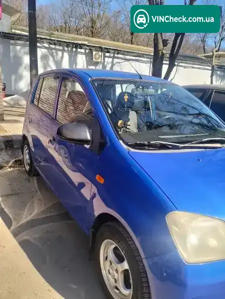 Daihatsu Cuore 2004, фото з оголошення 2 з 5, VIN JDAL251S001030663