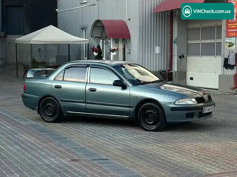 Mitsubishi Carisma 2002, фото з оголошення 2 з 20, VIN XMCSNDA1A2F024427