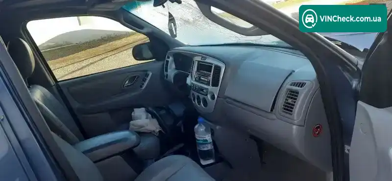 Mazda Tribute 2000, фото з оголошення 2 з 10, VIN JMZCU08171KM01689