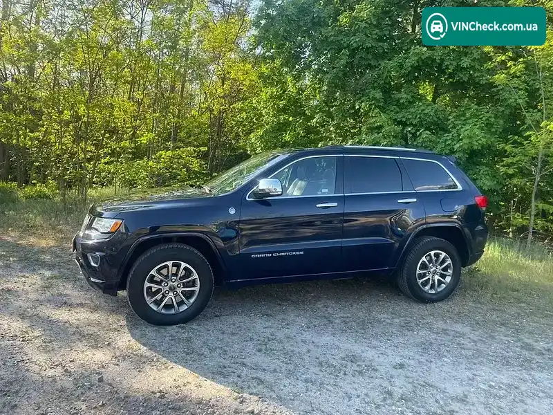 Jeep Grand Cherokee 2014, фото з оголошення 2 з 21, VIN 1C4RJFCMXEC523313