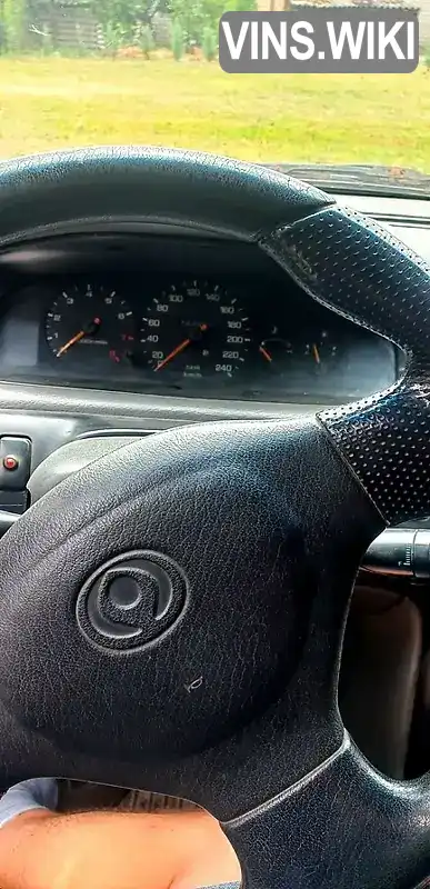 Mazda 626 1994, фото з оголошення 2 з 8, VIN JMZGE12A201312331