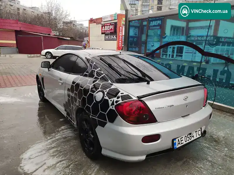 Hyundai Coupe 2002, фото з оголошення 2 з 11, VIN KMHHN61BP2U030037