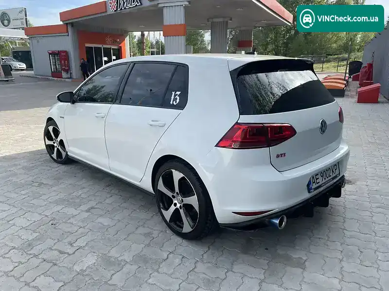 Volkswagen Golf 2014, фото з оголошення 2 з 13, VIN 3VW5T7AU0FM009906
