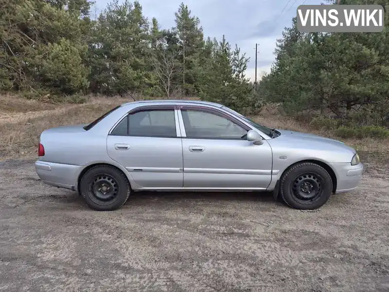 Mitsubishi Carisma 2002, фото з оголошення 2 з 16, VIN XMCSNDA1A2F013209