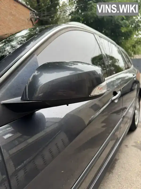 Renault Laguna 2010, фото з оголошення 2 з 13, VIN VF1KT0A0643900975