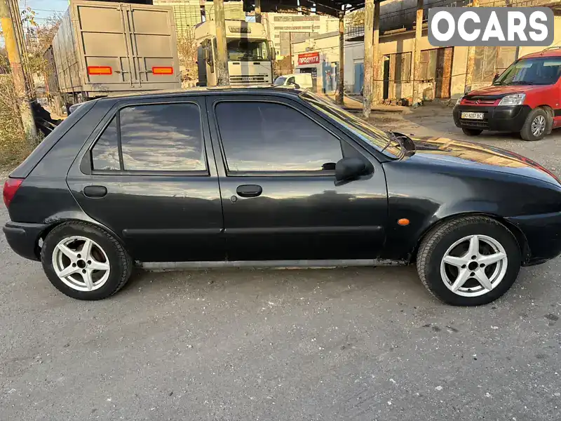 Mazda 121 1996, фото з оголошення 2 з 21, VIN YCMAXXBAJATC10405