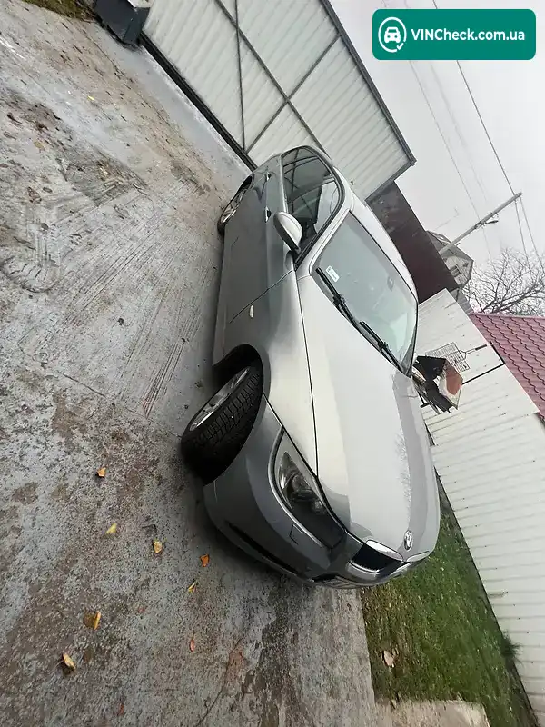 BMW 3 Series 2006, фото з оголошення 1 з 13, VIN WBAVU31040KY22053