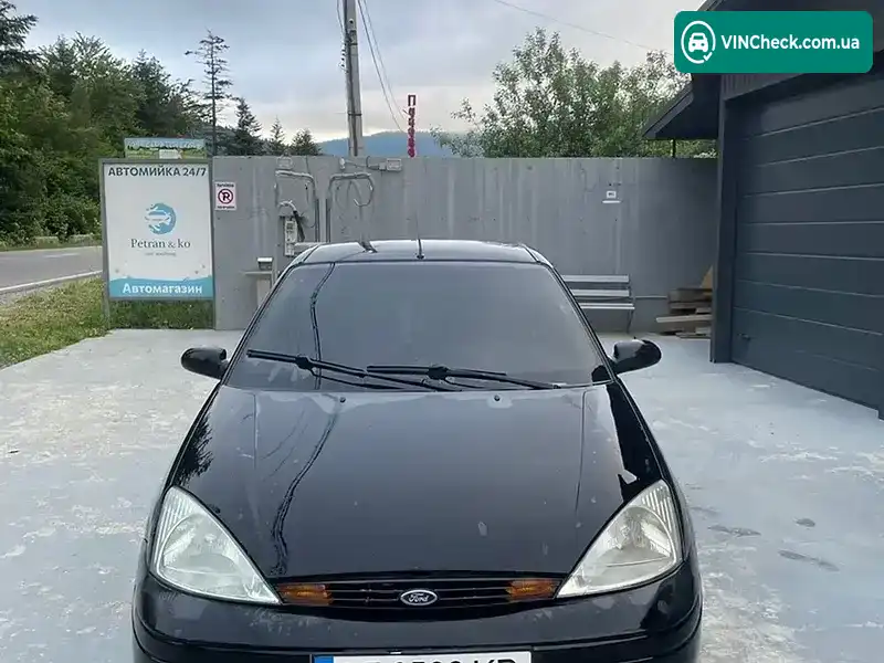 Ford Focus 1999, фото з оголошення 2 з 8, VIN 1FAFP3433YW177166