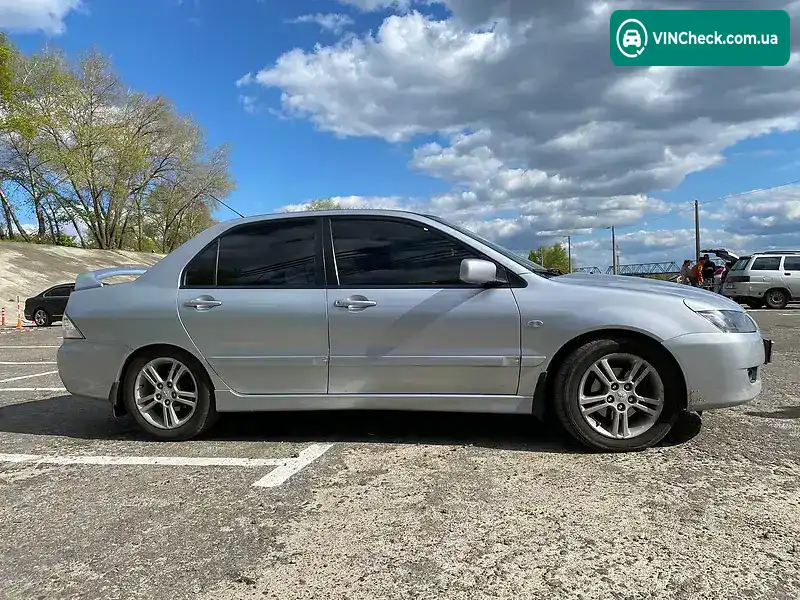 Mitsubishi Lancer 2004, фото з оголошення 2 з 10, VIN JMBSNCS9A5U000634