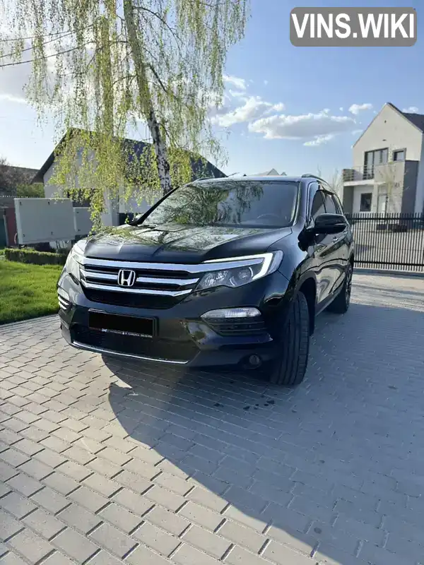 Honda Pilot 2017, фото з оголошення 2 з 21, VIN 5KBYF6870HB400208