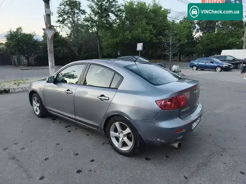 Mazda 3 2004, фото з оголошення 2 з 14, VIN JMZBK12F251188900
