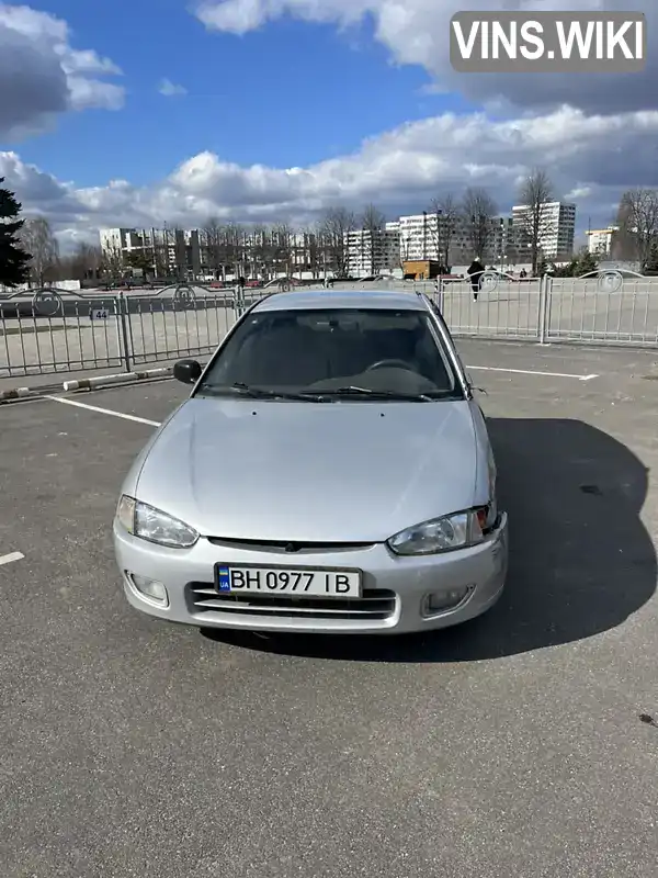 Mitsubishi Colt 1996, фото з оголошення 2 з 14, VIN JMBMNCJ4ATU003362