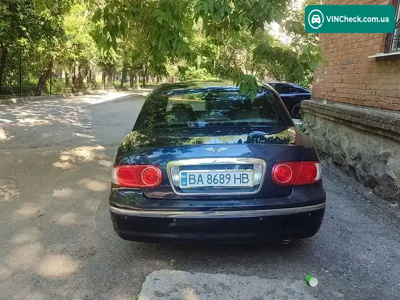 Kia Opirus 2005, фото з оголошення 2 з 20, VIN KNELD224355054101