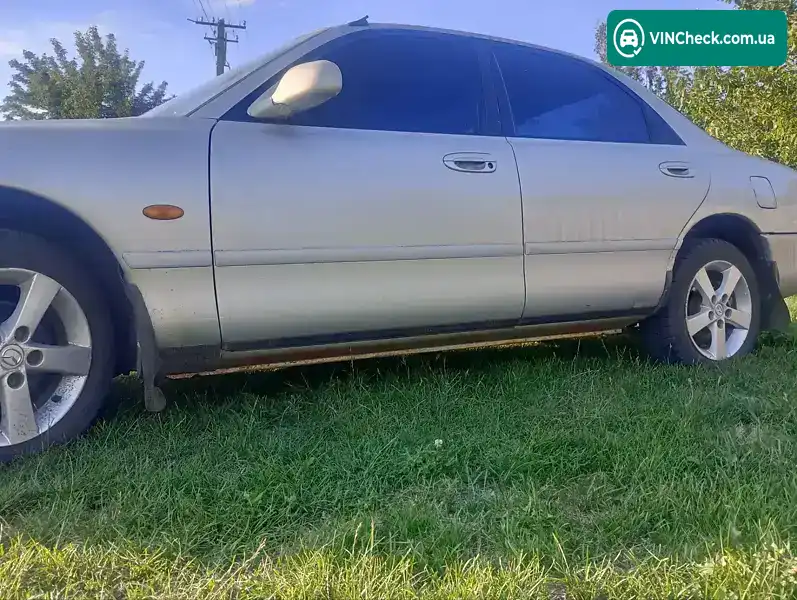 Mazda 626 1994, фото з оголошення 2 з 11, VIN JMZGE12A201248955