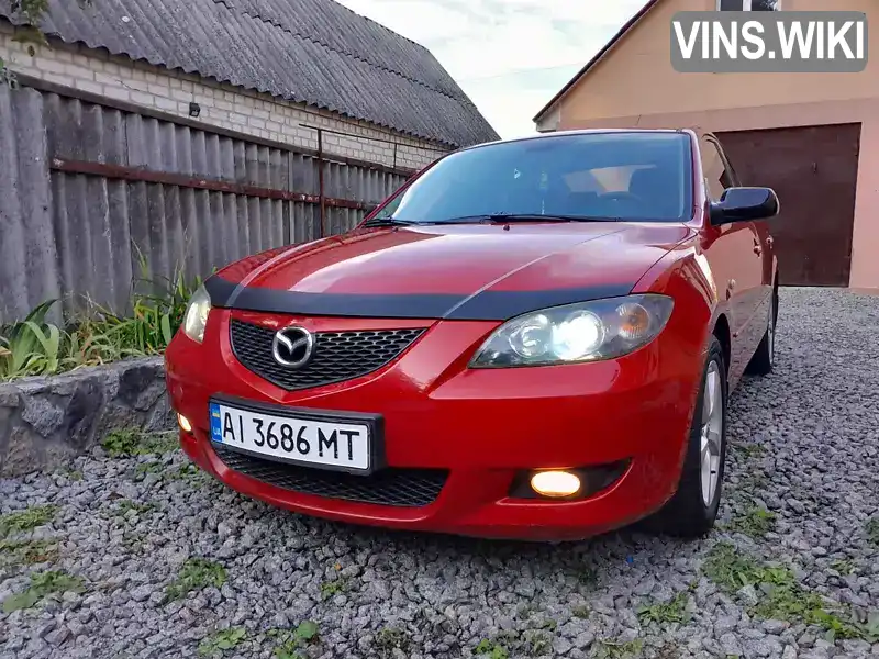 Mazda 3 2006, фото з оголошення 1 з 21, VIN JMZBK12Z271384114