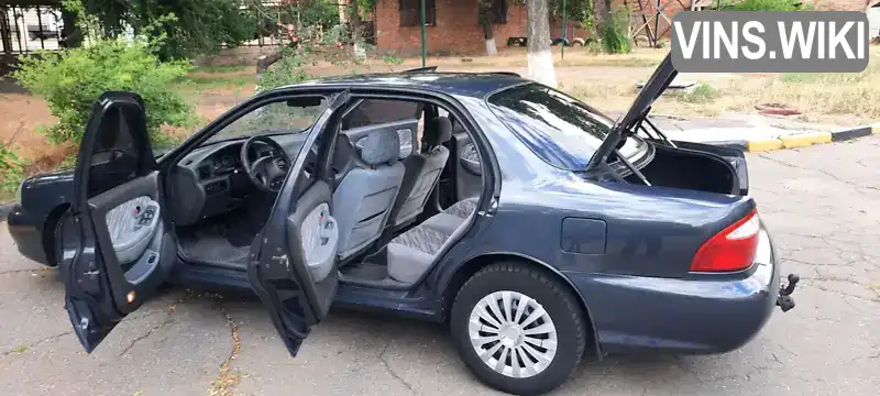 Kia Clarus 1999, фото з оголошення 2 з 21, VIN KNAGC2292X5524617