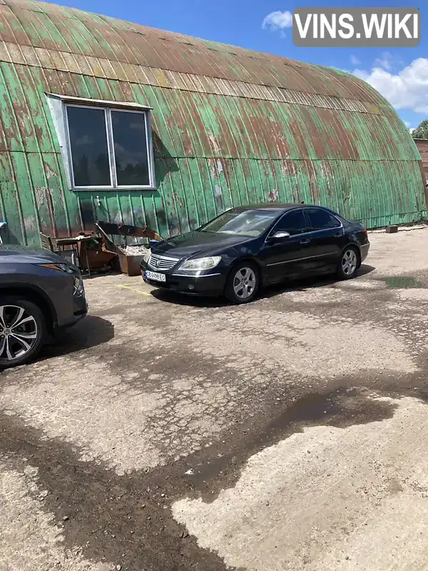 Acura RL 2005, фото з оголошення 2 з 17, VIN JH4KB16555C010717