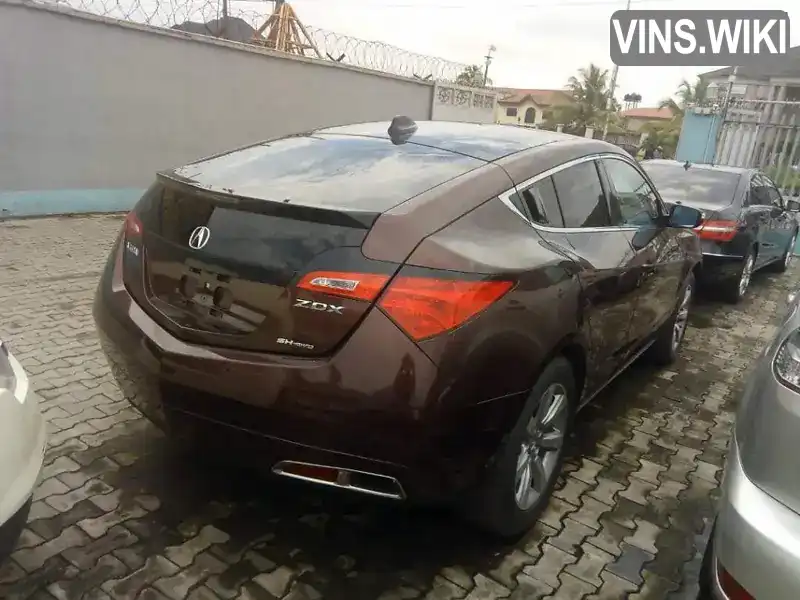 Acura ZDX 2010, фото з оголошення 2 з 21, VIN 2HNYB1H61AH500381
