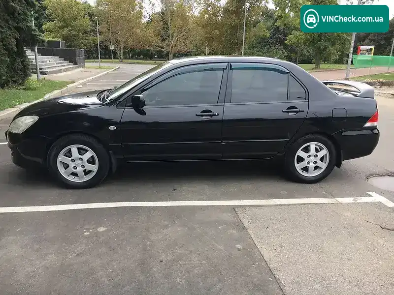Mitsubishi Lancer 2004, фото з оголошення 2 з 19, VIN JMBSNCS3A5U005183