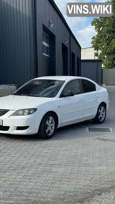 Mazda 3 2004, фото з оголошення 1 з 12, VIN JM1BK12F341195568