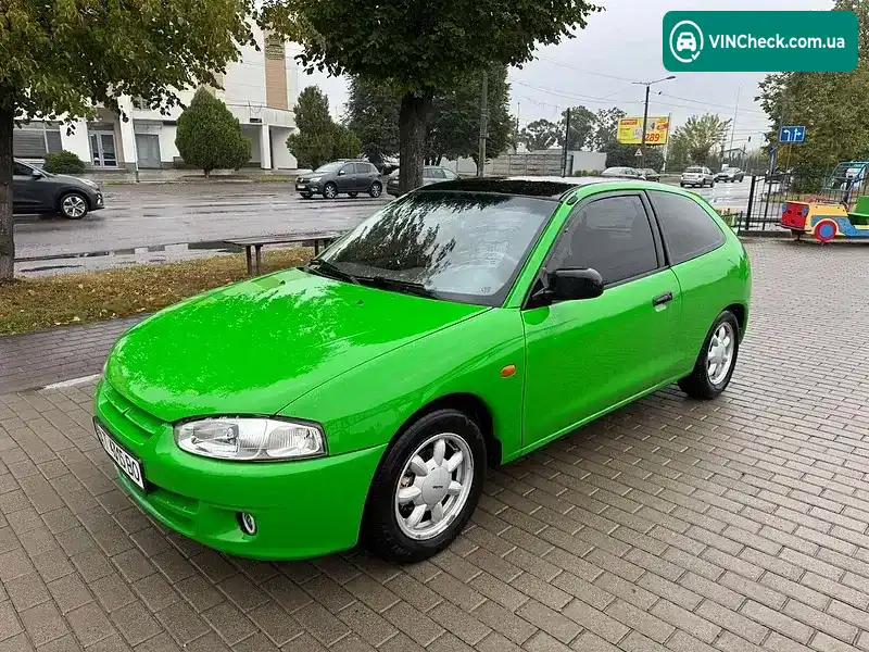 Mitsubishi Colt 1996, фото з оголошення 2 з 11, VIN JMBMNCJ1ATU003644