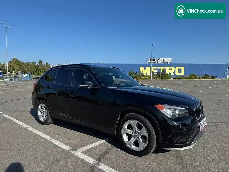 BMW X1 2014, фото з оголошення 2 з 20, VIN WBAVM1C51FVW57390