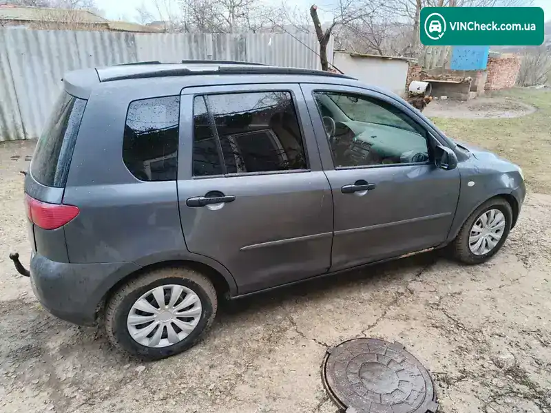 Mazda 2 2003, фото з оголошення 2 з 4, VIN JMZNE2WPJN3M02852
