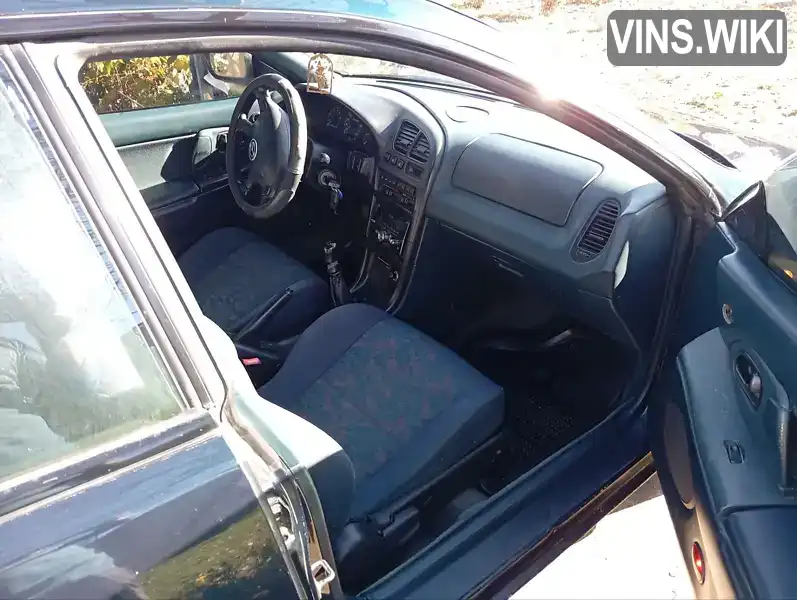 Mazda 323 1994, фото з оголошення 2 з 17, VIN JMZBA145201161070