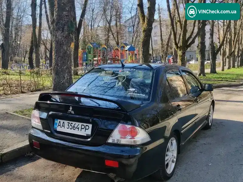 Mitsubishi Lancer 2004, фото з оголошення 1 з 21, VIN JMBSNCS9A4U000683