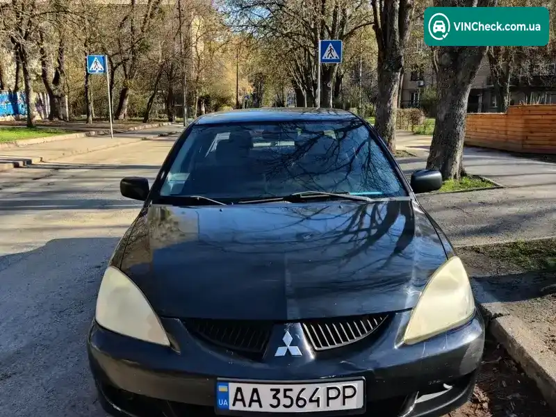 Mitsubishi Lancer 2004, фото з оголошення 2 з 21, VIN JMBSNCS9A4U000683