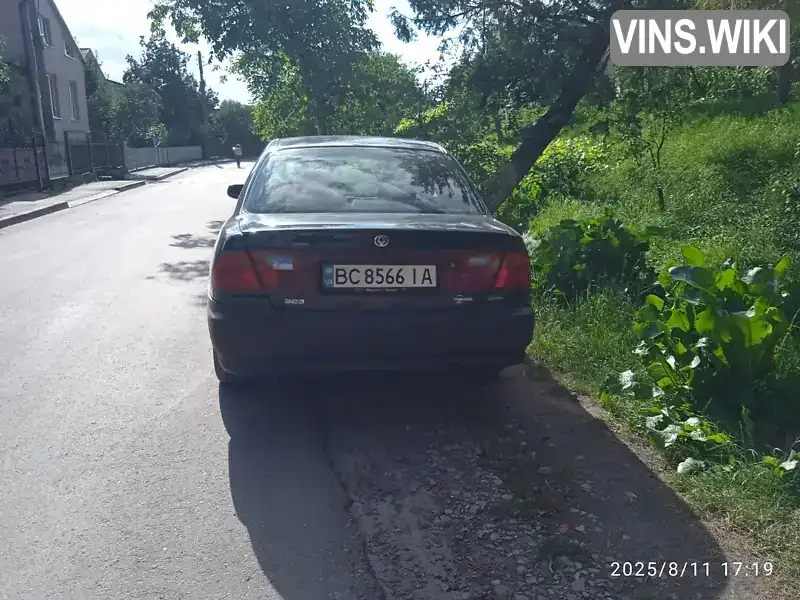 Mazda 323 1998, фото з оголошення 2 з 9, VIN JMZBA125200620303