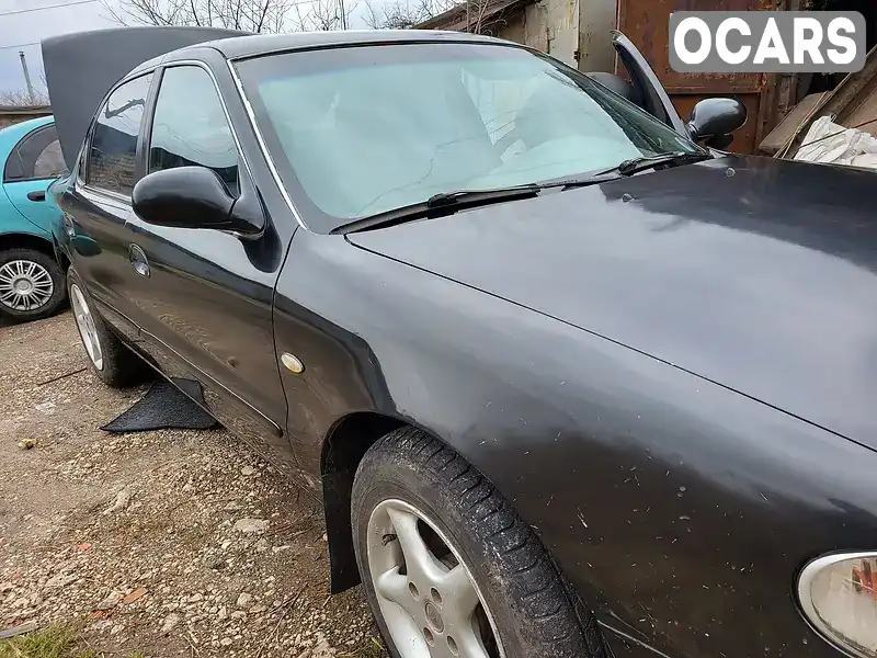 Kia Clarus 1997, фото з оголошення 2 з 14, VIN KNEGC2232V5609884