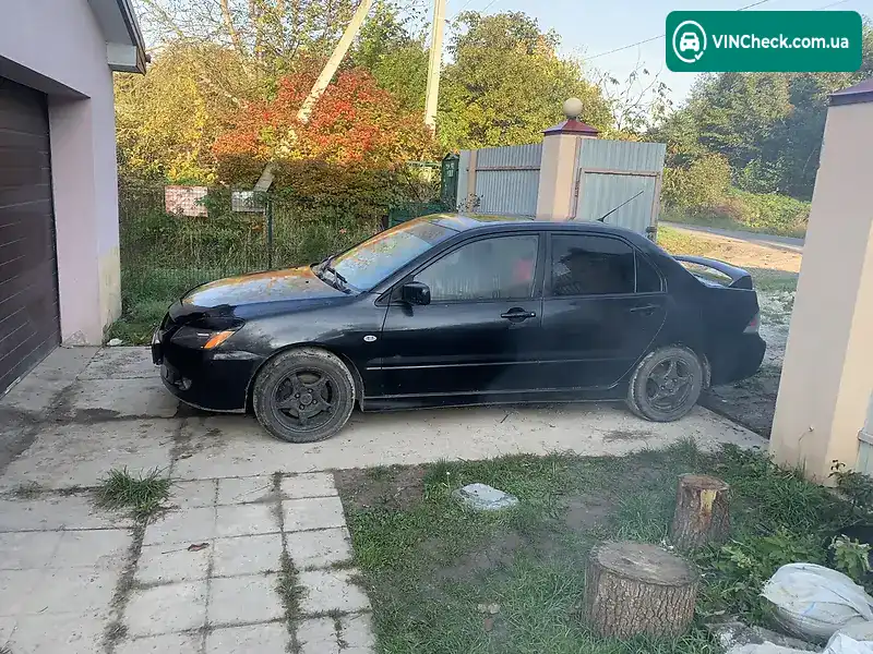 Mitsubishi Lancer 2004, фото з оголошення 2 з 13, VIN JA3AJ86E54U020616