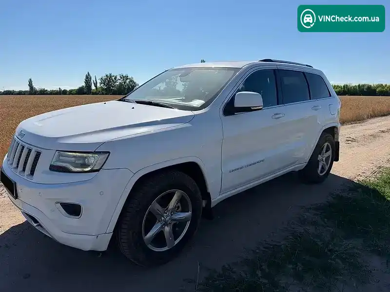 Jeep Grand Cherokee 2013, фото з оголошення 2 з 14, VIN 1C4RJFCM5EC244089