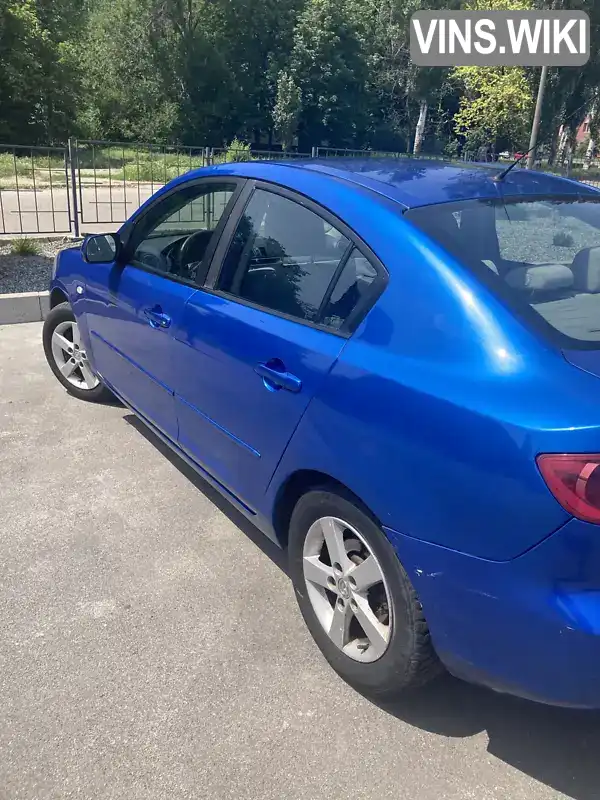 Mazda 3 2004, фото з оголошення 2 з 21, VIN JMZBK12Z251153333
