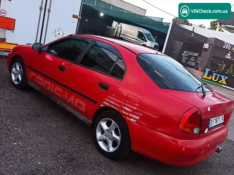 Mitsubishi Carisma 1997, фото з оголошення 2 з 20, VIN XMCLNDA1AWF033965