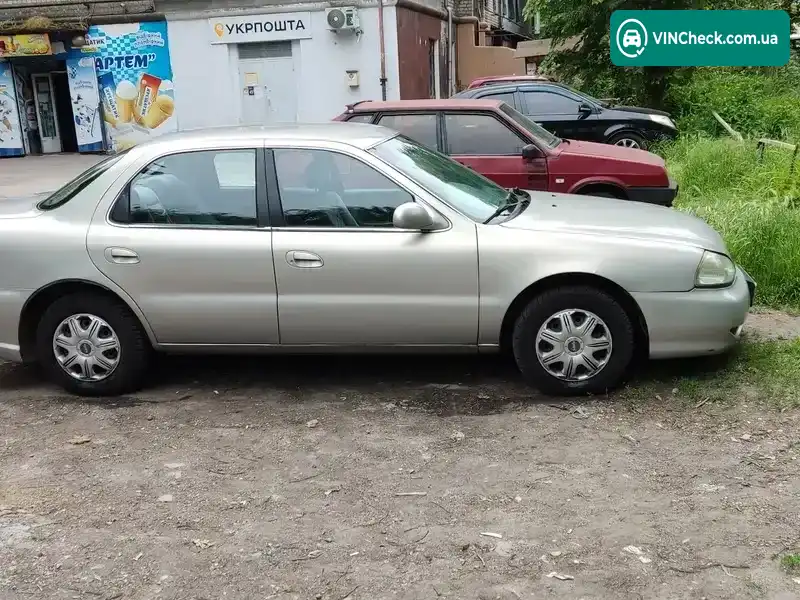 Kia Clarus 1998, фото з оголошення 2 з 10, VIN KNAGC2292W5521015
