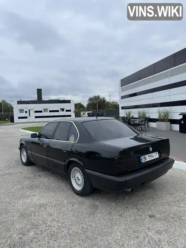 BMW 5 Series 1994, фото з оголошення 1 з 14, VIN WBAHA71030GG57129