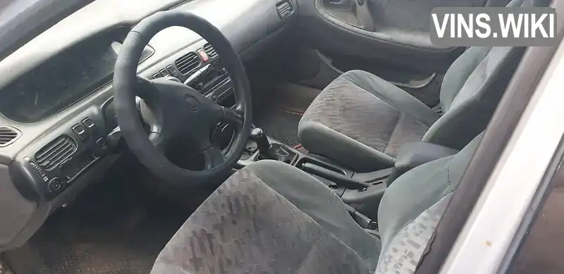 Mazda 626 1993, фото з оголошення 2 з 4, VIN JMZGE14F201110119