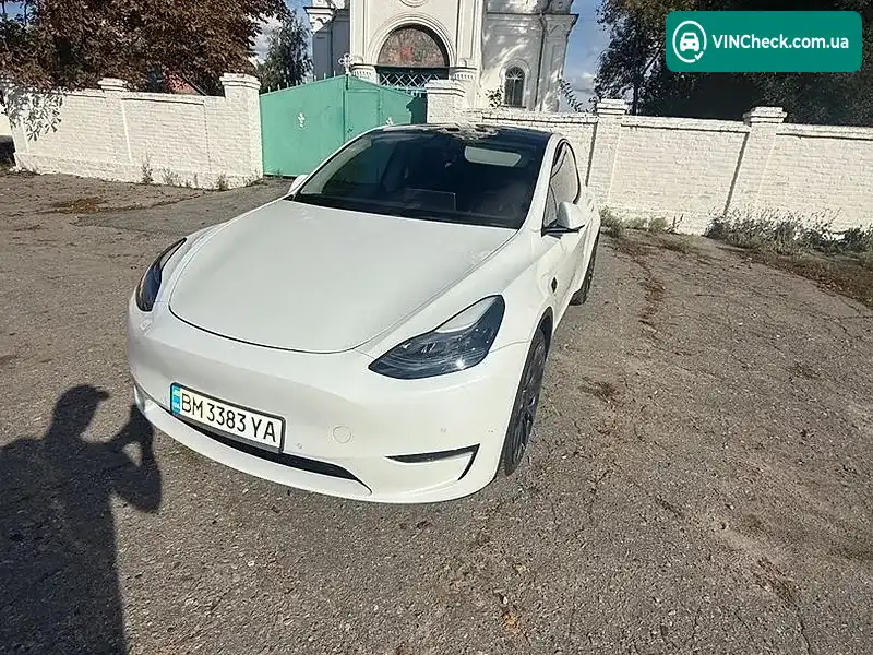 Tesla Model Y 2022, фото з оголошення 2 з 12, VIN 7SAYGDEFXNF381791