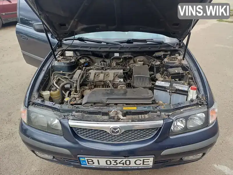 Mazda 626 1997, фото з оголошення 2 з 12, VIN JMZGF14S201109127