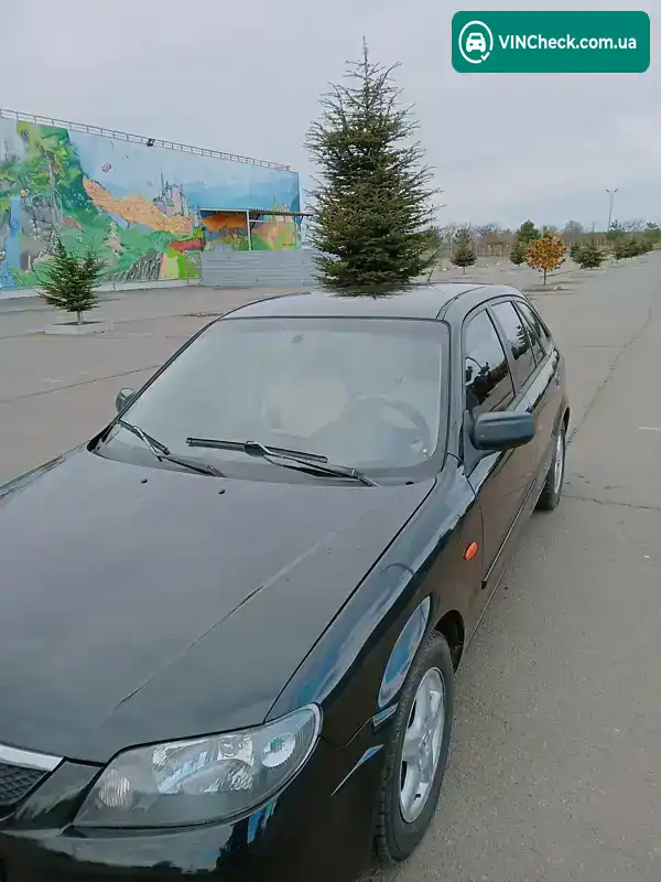 Mazda 323 2003, фото з оголошення 1 з 20, VIN JMZBJ14M231503356