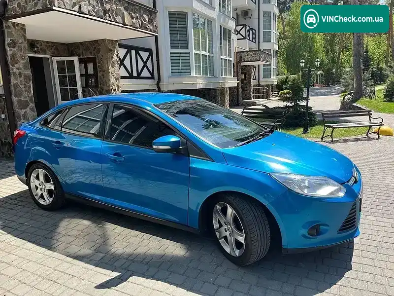 Ford Focus 2014, фото з оголошення 2 з 21, VIN 1FADP3F28EL353671