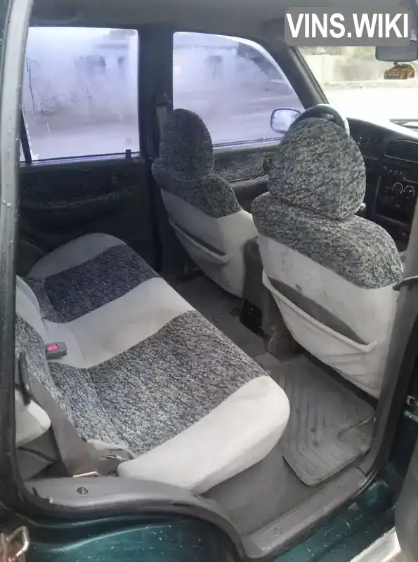 Kia Carnival 1999, фото з оголошення 2 з 21, VIN KNAJA5235X5127011