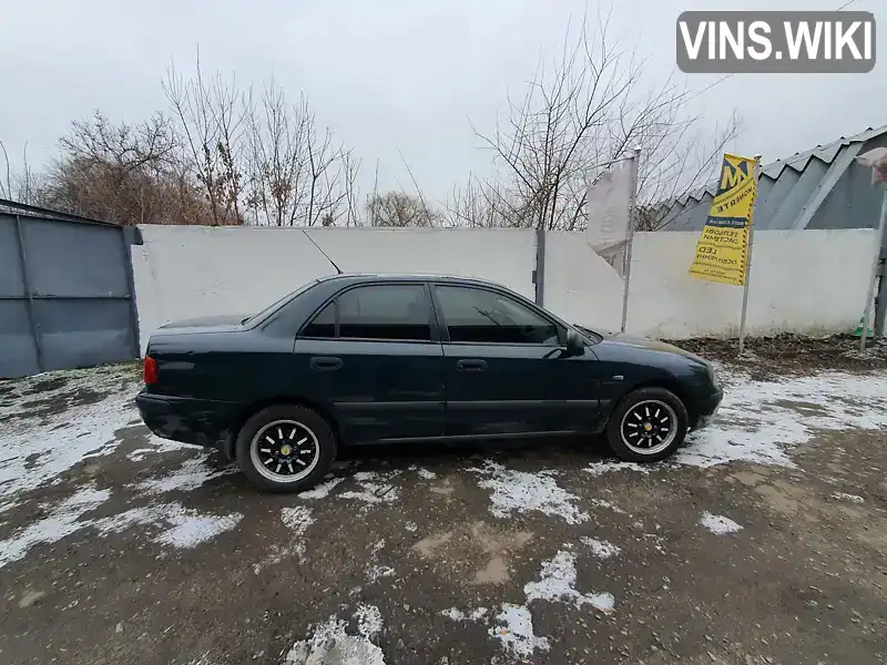 Mitsubishi Carisma 1999, фото з оголошення 1 з 21, VIN XMCSNDA1AYF013985