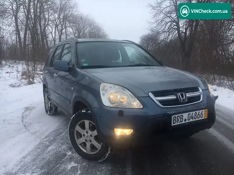 Honda CR-V 2004, фото з оголошення 2 з 14, VIN SHSRD87604U209855