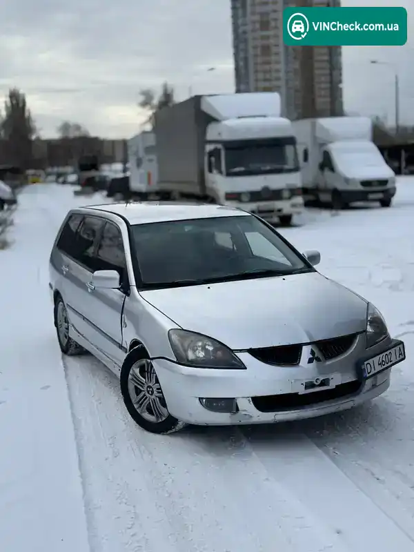 Mitsubishi Lancer 2003, фото з оголошення 2 з 10, VIN JMBLNCS9W4U000831