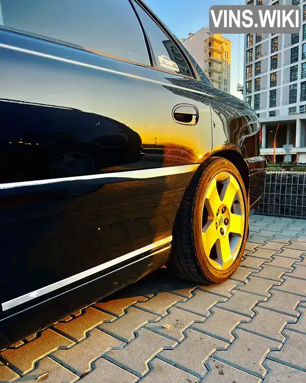 Opel Omega 2003, фото з оголошення 2 з 21, VIN W0L0VBF6931140136